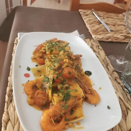 Отель L'escala Кульера